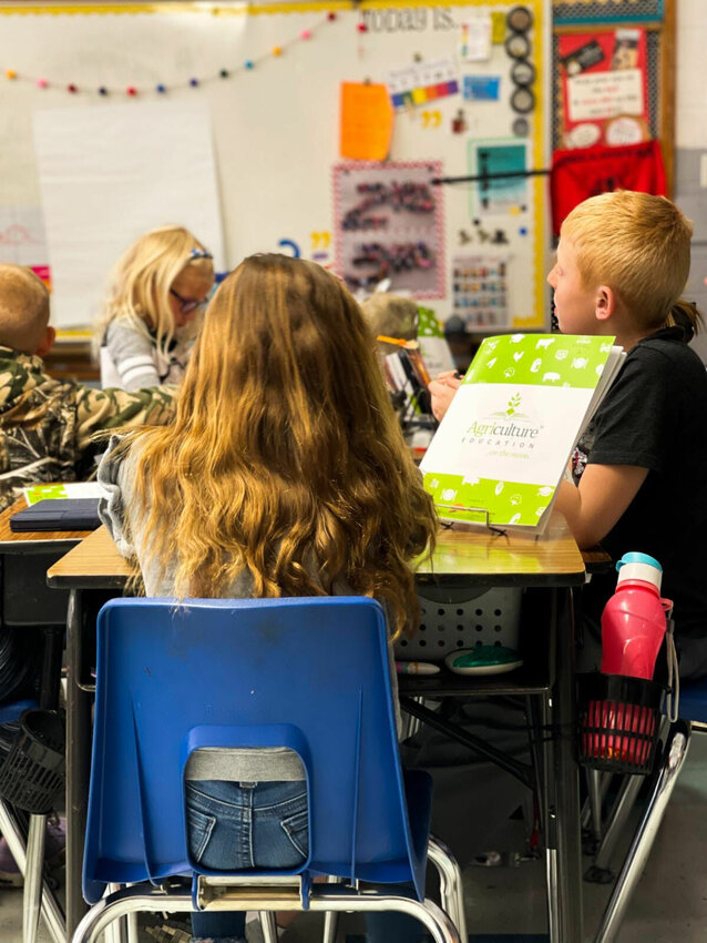 Members of local FFA chapters are volunteering in area classrooms this spring as elementary students participate in Agriculture Education on the Move.   Photo courtesy of Missouri Farmers Care