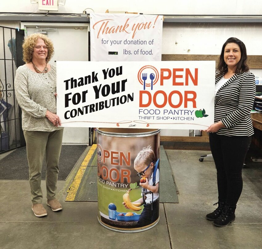 Reed &amp;amp; Sons&rsquo; Fine Jewelry and Repair hosted a food drive to help Open Door Service Center fight hunger in Pettis County. Reed &amp;amp; Sons&rsquo; collected 117 pounds of food. From left are Open Door Director of Development Michelle O&rsquo;Donnell and Executive Director Amanda Davis.   Photo courtesy of Open Door Service Center