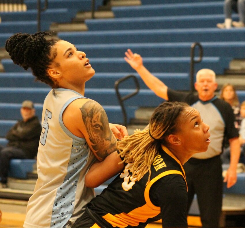 Sophomore Quincenia Jackson fights for a rebound against a Three Rivers Community College defender during the game Wednesday night. Jackson scored three points and had 10 rebounds. Photo by Jack Denebeim | Democrat