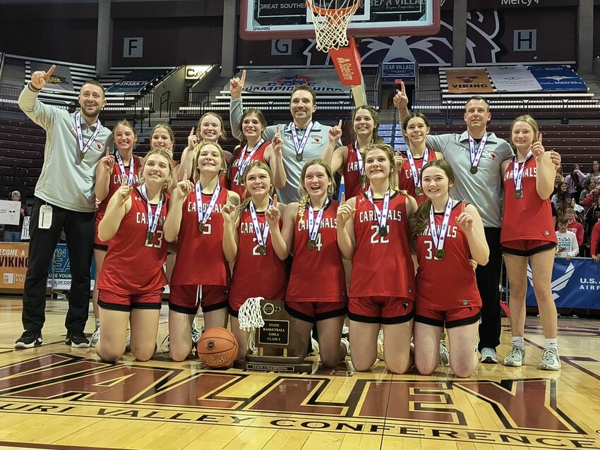 The Tipton girls basketball team celebrates its first-ever Class 2 state championship after the Cardinals defeated Bishop LeBlond 55-36 on March 11, 2023.   File photo by Bryan Everson | Democrat