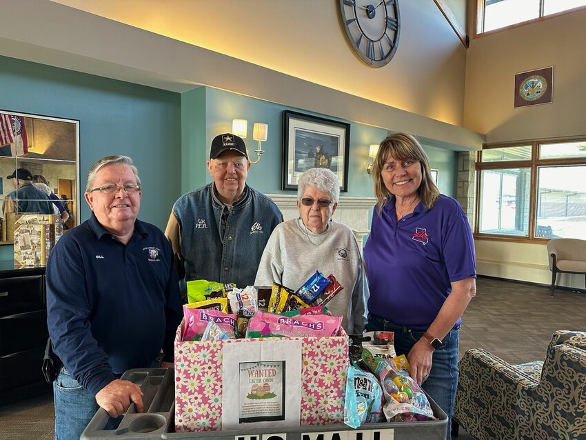 The Sedalia Elks Lodge donated Easter candy to the Missouri Veterans Home-Warrensburg for its Easter activities. Pictured are Bill Monsees, Virgil Kurtz, Judy Kurtz and Carla Scott.   Photo courtesy of Sedalia Elks Lodge