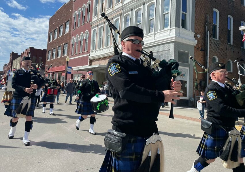 Bagpiper Craig Roberts with the Mid-Missouri Pipe Band heads up Saturday's St Patrick's Parade on South Ohio Avenue in downtown Sedalia. Festively-garbed Sedalians came out in large numbers for the sunny skies, hometown parade and festivities.   Photo by Chris Howell | Democrat