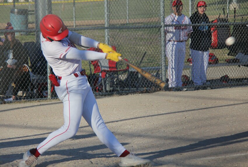 Senior Gavin Caldwell hits a grand slam during the game against Versailles Monday. Caldwell went three for four with two home runs and a double in the Gremlins&rsquo; 15-0 win.   Photo by Jack Denebeim | Democrat   &nbsp;