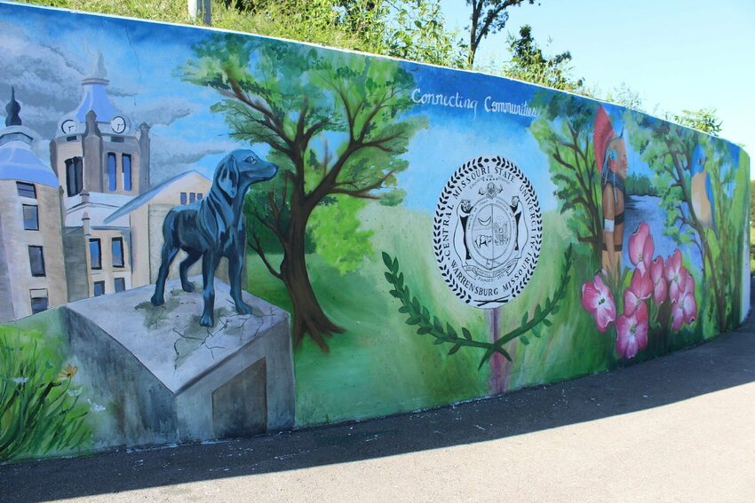 Stefanie Aziere-Sattler&rsquo;s mural located on the Spirit Trail, pictured in August 2021, embodies the theme of &ldquo;connecting communities&rdquo; by depicting different parts of the community like Old Drum and Pertle Springs.   File photo by Dustin Steinhoff | Warrensburg Star-Journal