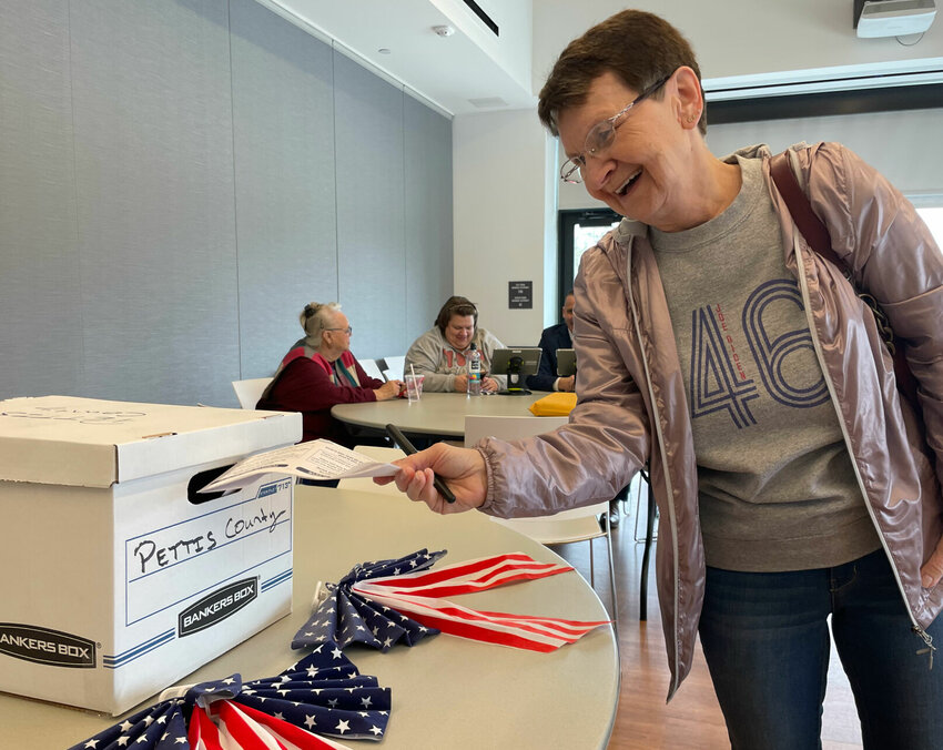 Sandra Self votes at the Democratic presidential primary Saturday, March 23 at the Heckart Community Center. Employees of the Pettis County Clerk's Office were on hand to help with the voting process.   Photo by Chris Howell | Democrat