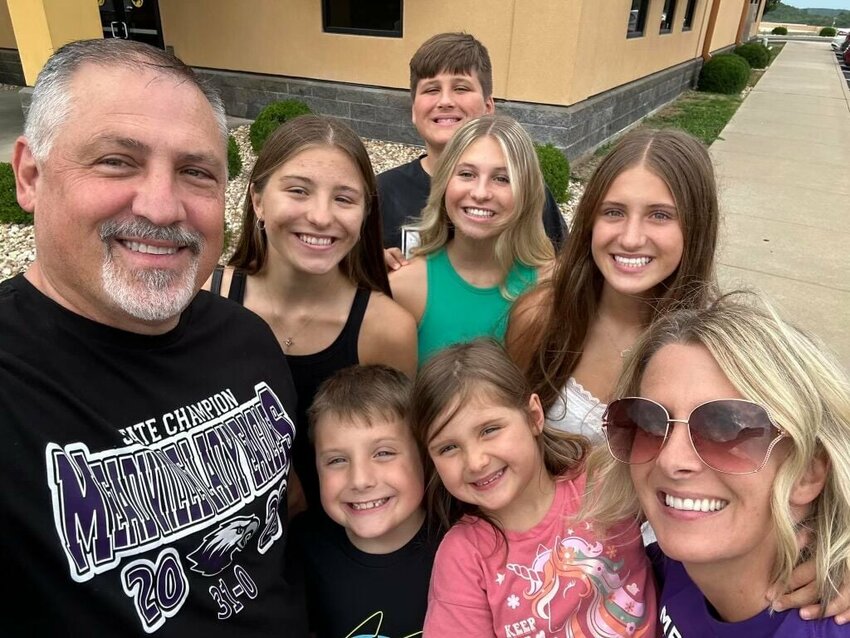 Steve Carvajal celebrates his hire as Tipton&rsquo;s new activities director with his family. His wife, Heather, will become an English teacher in Tipton as well. The Carvajal's daughters are Brooklyn, Paige and Madison while their sons are Easton, Chase and Kooper.   Photo courtesy of Steve Carvajal