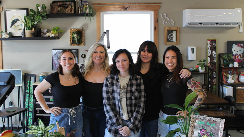 From left, tattoo artists Renee Catledge, Katy Lightburne, Lauren Hall, Marimi Heyde, and Cat Garden pose for a portrait on Tuesday, March 12, at the Gallery Tattoo Studio in Knob Noster. 


Photo by Zach Bott | Warrensburg Star-Journal