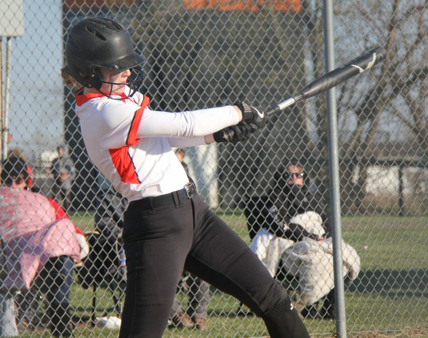 Northwest senior Karli Smith swings her bat during the Mustangs&rsquo; home opener against Santa Fe on March 20 in Hughesville. The Mustangs enter the Kaysinger Conference softball tournament as the No. 1 seed.   Photo by Jack Denebeim | Democrat File Photo