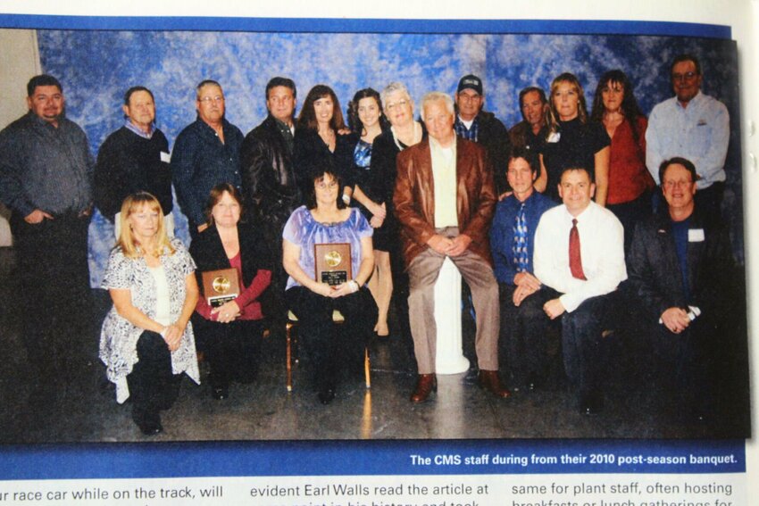 Earl, center wearing a brown jacket, and Susan, center left behind Earl, pose with their staff for a photo in Dirt-Modified Magazine in 2015. The Wallses bought Central Missouri Speedway in 1994, and have worked tirelessly to make it the track it is today 30 years later. 


Photo by Zach Bott | Warrensburg Star-Journal