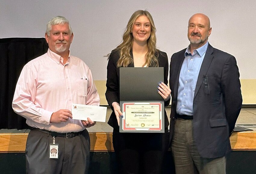Smith-Cotton High School senior Lauren Homan has received a $750 scholarship from the Missouri Association of Rural Educators to study education at the University of Central Missouri. She is shown with, left, Dr. Troy Marnholtz, Warrensburg Schools Assistant Superintendent and MARE treasurer, and Dwayne Martin of EdCounsel, which sponsors the scholarships.


Photo courtesy of Sedalia School District 200