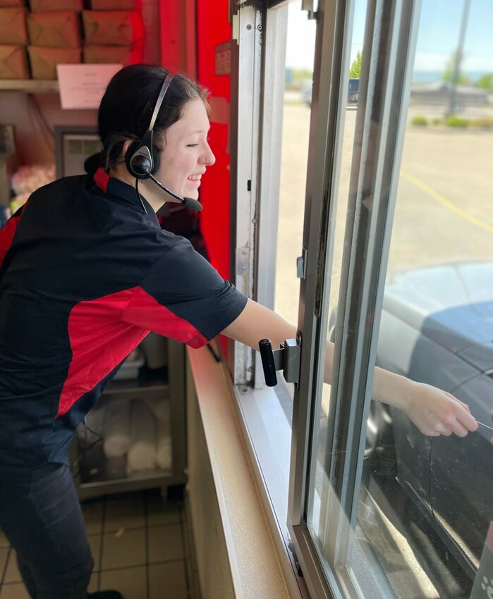 Angel Hughes has been working at Steak 'n Shake for six months and said the job has given her better skills in communication, problem solving and customer interaction. A paycheck and new friends come with the job as well.


Photo by Chris Howell | Democrat