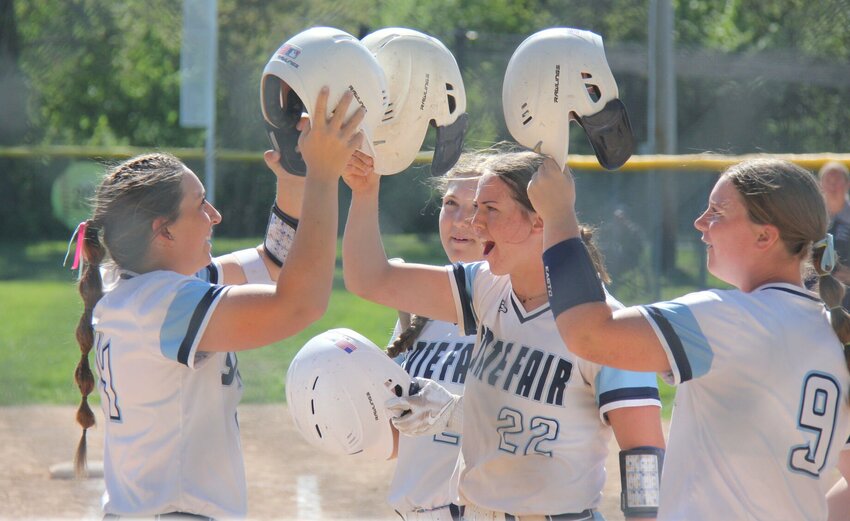 Sophomore Sami Picha, left, celebrates hitting a two-run home run with her teammates as she crosses home plate during the State Fair Community College softball team’s game against St. Charles Community College on Friday, April 19 at Centennial Park.


Photo by Jack Denebeim | Democrat