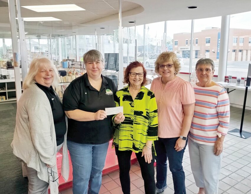 The Sedalia Area Literacy Council donated a check for $650 to the Boonslick Regional Library in support of its summer reading program, &quot;Adventure Begins at Your Library.&quot; The funds will be used to provide a book to each child signing up for the Reading Club. From left, Linda Allcorn, Boonslick Regional Library director; Jo Boger, Sedalia Branch supervisor; Betty Albrecht, Boonslick Regional Library and SALC president; and Ginger Buchanan and Noreen Loveall, SALC members.   Photo courtesy of the Sedalia Area Literacy Council&nbsp;