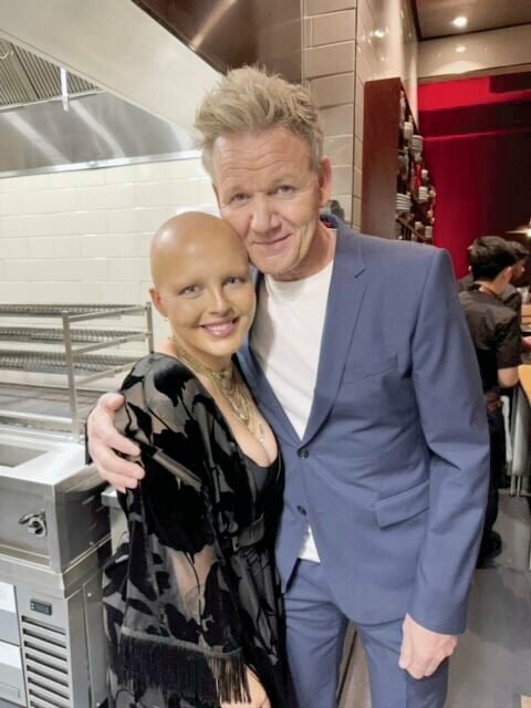 The late Maddy Baloy, 26, formerly of Sedalia, gets a hug from renowned Chef Gordon Ramsey in February. Meeting Ramsey was one of 20 items on Baloy's bucket list after she found she had stage-four cancer in 2023.   Photo courtesy of Carissa and Lucky Talmage