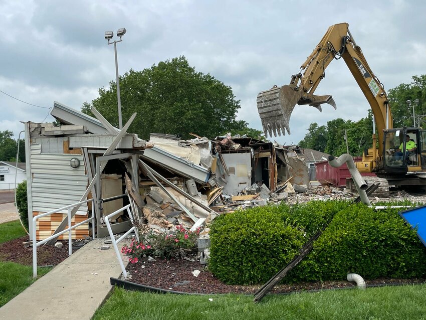 Crews from C&amp;amp;E Excavating make quick work of the Long John Silver's/A&amp;amp;W, 922 South Limit Ave., as the structure is demolished Wednesday, May 15. The restaurant has been closed since it was damaged in a late-night fire March 26. According to the Sedalia Fire Department, there was &ldquo;significant damage&rdquo; in the kitchen and the roof directly above the kitchen area. The building also suffered significant smoke, heat, and water damage throughout the facility. SFD stated the fire originated in the kitchen area.   Photo by Chris Howell | Democrat