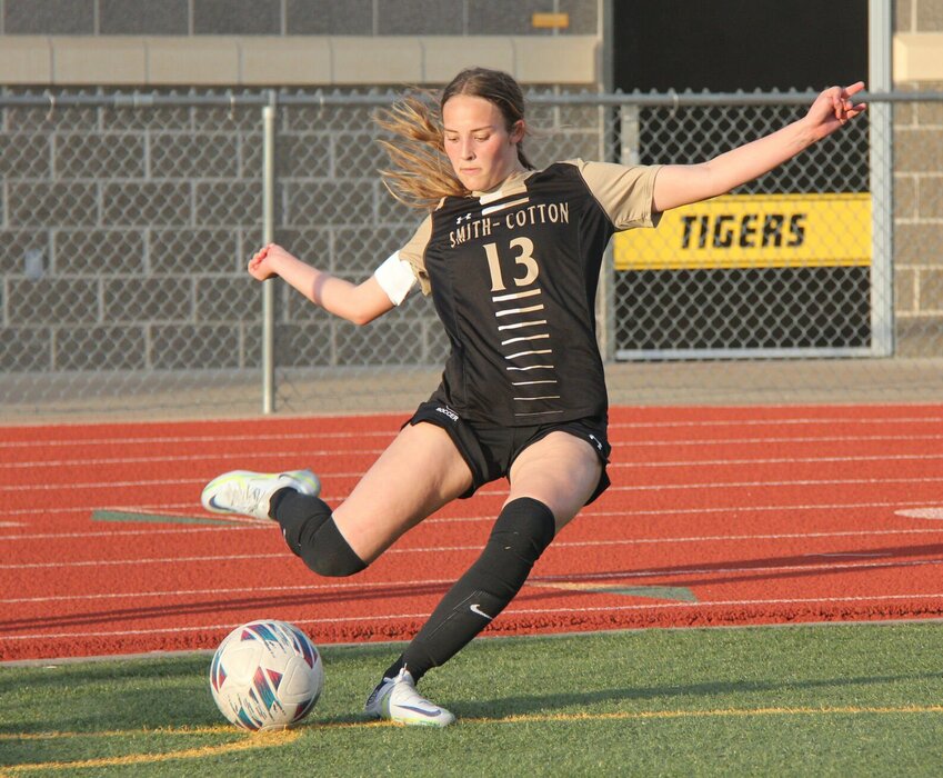 Smith-Cotton senior Kendall Jackson blasts the ball on a corner kick during the game against Warrensburg at Smith-Cotton High School Tuesday, April 9. The Tigers finished the season with a 10-11 record after losing to Blue Springs 5-0 Monday, May 13, in the Class 4 District 6 Tournament.   File photo by Jack Denebeim | Democrat