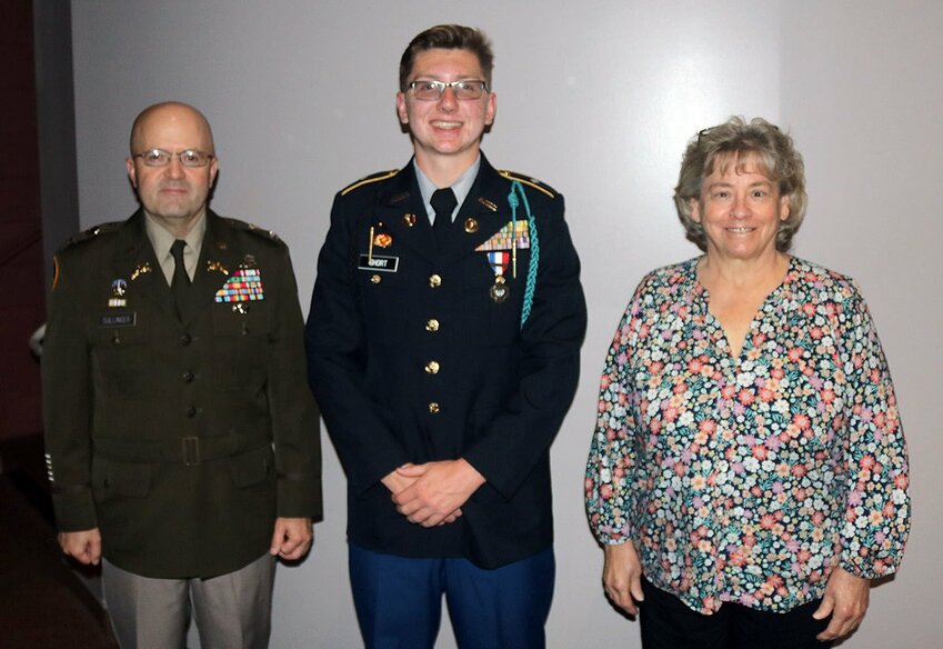 Smith-Cotton JROTC Cadet Draiven Short was recognized during the May 20 Sedalia School District 200 Board of Education meeting as a recipient of the Legion of Valor Bronze Cross for Outstanding Achievement Award, the highest honor available for JROTC cadets. At right is Board President Diana Nichols. Col. Joey Sullinger, left, an Army JROTC instructor at S-C, said only 50 cadets out of about 500,000 nationwide earned the honor this year. Cadets are selected based on their academic record, class standing and leadership, among other criteria. Short is the latest in a long line of S-C JROTC cadets to earn the honor, including Leia Goodwin, Brittany Bobbitt, Ericka Tackett, Laura Haney, Krysta Ott, Hannah Ott, Caitlyn Craig, Paul Chernookiy, Jordan Bush, Alexandria Stewart, Aurora Raphael, Shelbi Davis and Nikkole Warren.


Photo courtesy of Sedalia School District 200