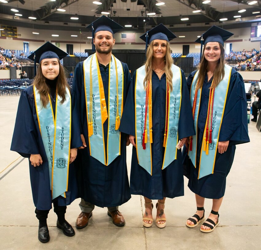 State Fair Community College named four Distinguished Students for 2024, who were recognized during the commencement ceremony Friday evening, May 17. From left, Galina Pokitko, Mason Barnett, Lexi Lewis, and Addie Berry.   Photo courtesy of State Fair Community College