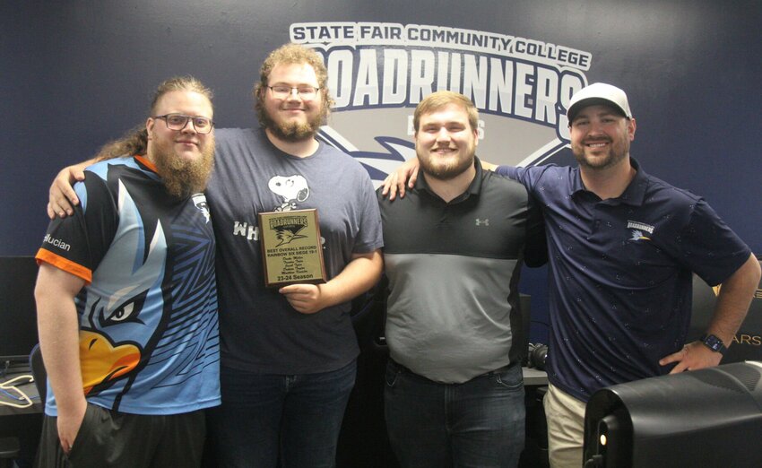 Members of the State Fair Community College esports team, from left, Trenton Toler, Drake Miller, Matthew Kreisler and head coach Jake Coleman, celebrate the Rainbow Six Siege team&rsquo;s national championship victory. The team defeated University of South Carolina-Sumter 7-5 in the finals to win the championship on May 4.   Photo by Jack Denebeim | Democrat