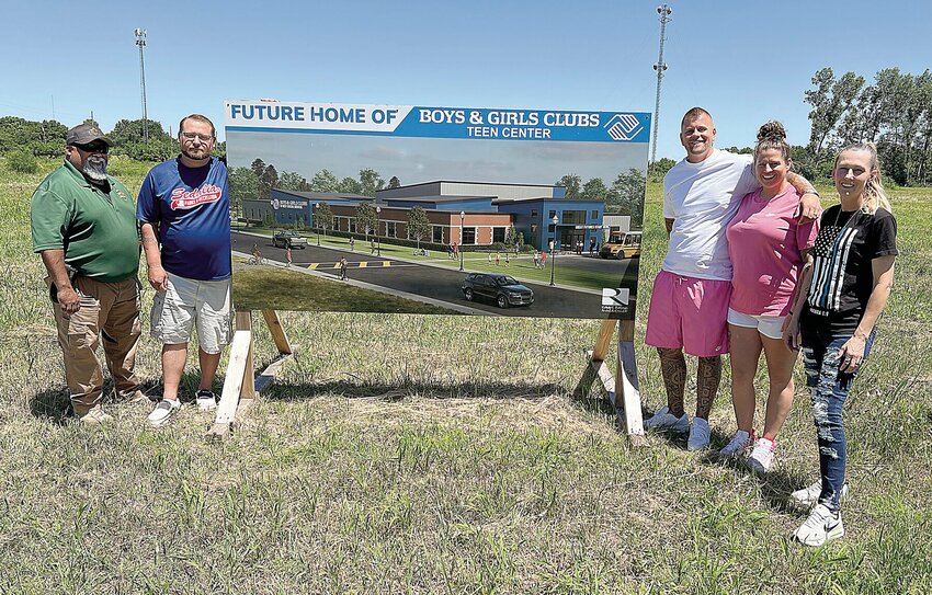 On Monday, June 10, from left, Pettis County Sheriff's Office Community Interaction Deputy Larry Parham stands with formerly incarcerated individuals Chris Brown, William Kitarogers and his wife Lindsay, and Charlene Snyder, who stand beside the sign depicting the new Boys and Girls Club Teen Center. Brown, Kitarogers and Snyder turned their lives around and are helping raise funds for the project.   Photo by Faith Bemiss-McKinney | Democrat