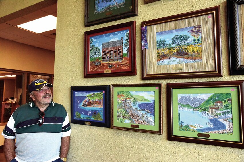 Roman Sebastian, of Warsaw, has an art exhibit at J&amp;amp;D Pharmacy in Warsaw. Sebastian is also an author of five books, a poet, and a musician. He often gets his artistic inspiration from dreams while he is sleeping at night.   Photo by Faith Bemiss-McKinney | Democrat