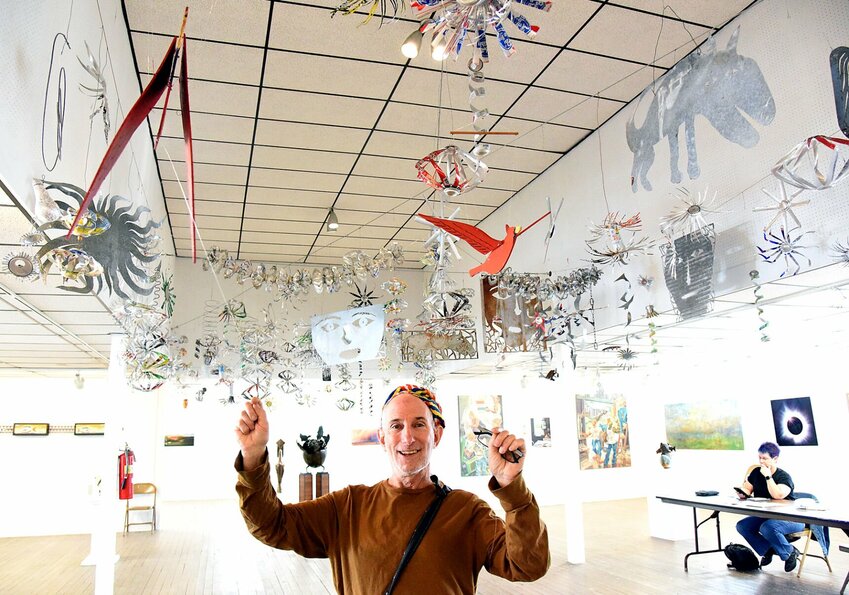Artist Allan Winkler, of Kansas City, stands among his art installation on Friday, Aug. 9, in the Missouri State Fair Fine Arts Building. Winkler said the work took 12 years to make and two days to install.   Photo by Faith Bemiss-McKinney | Democrat