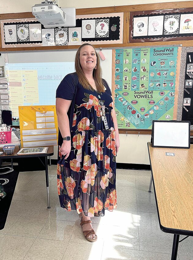 Washington Elementary Special Education teacher Kayla Zbornak enjoys engaging her 26 students in learning processes, whether it's broadening their horizons with travel stories or offering summer enrichment of dinosaurs, space, and camping lessons.   Photo by Faith Bemiss-McKinney | Democrat