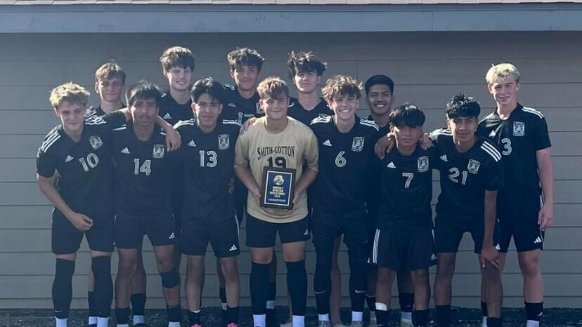 The Smith-Cotton soccer team celebrates winning the Moberly Invitational Tournament Saturday, Sept. 28. The Tigers are now 7-7 on the season.   Photo courtesy of Smith-Cotton soccer