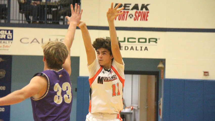 Northwest freshman Hayden Meyer (11) shoots a 3-pointer during the W-K Holiday Shootout game against Otterville on Saturday, Dec. 28, at State Fair Community College. Meyer hit four 3-pointers on the night.   Photo by Jack Denebeim | Democrat