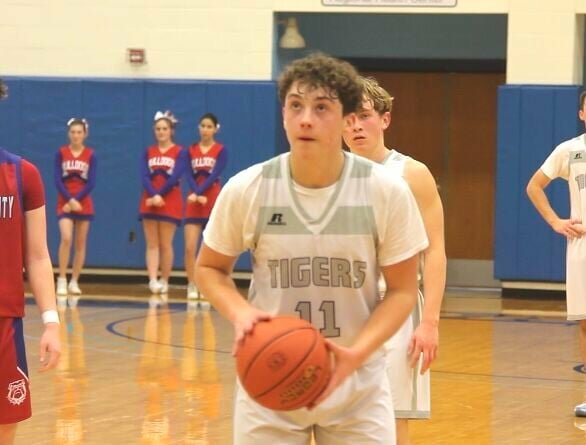 Green Ridge sophomore Max Tylar lines up the game-winning free throw during the W-K Holiday Shootout game against Appleton City on Saturday, Dec. 28, at State Fair Community College.   Photo by Jack Denebeim | Democrat