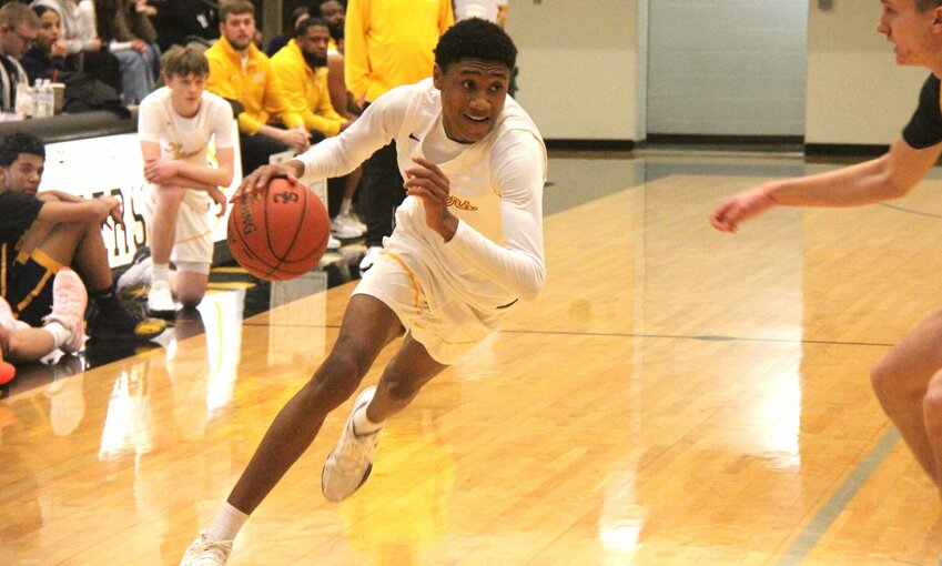 Smith-Cotton sophomore Drew Berry drives to the hoop during the game against Columbia Battle on Wednesday, Jan. 15, at Smith-Cotton High School.   Photo by Jack Denebeim | Democrat