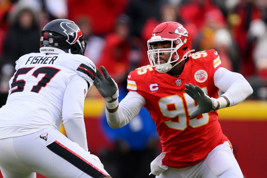 Kansas City Chiefs defensive tackle Chris Jones (95) rushes against Houston Texans offensive tackle Blake Fisher (57) during the first half of an NFL football divisional playoff game, Saturday, Jan. 18, 2025 in Kansas City, Mo. The Chiefs defeated the Texans by a score of 23-14.   Photo by Reed Hoffmann | AP Photo