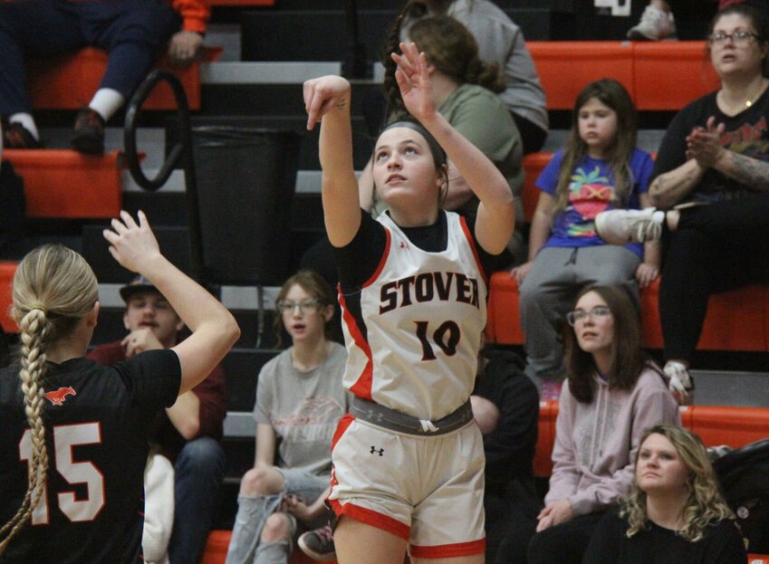 Stover senior Ashlyn Pinzke (10) shoots a 3-pointer during the game against Northwest on Tuesday, Jan. 28, in the Stover Dome. Pinzke finished with 26 points, 17 of which came in the first half.   Photo by Jack Denebeim | Democrat