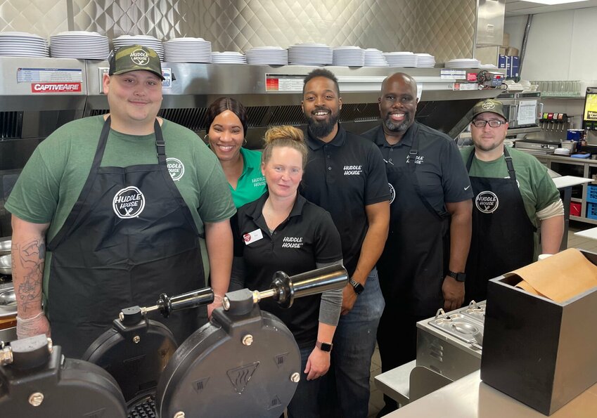 Huddle House employees David Buxton, Shereka Cotton, Kim Biegel, Malik Collins, Nicholas Stevens and Chris Bauer pose for a picture Thursday, Feb. 13, in the Huddle House kitchen. Huddle House is open 6 a.m. to 10 p.m.


Photo by Chris Howell | Democrat