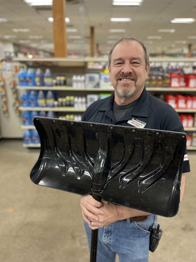 With frigid temperatures and as much as eight inches of snow predicted, store manager Scott Applegate is trying to anticipate shopper's needs by setting items like ice melt ant snow shovels near the front of the Family Center Farm &amp; Home. Applegate is holding his only remaining snow shovel until another shipment arrives.


Photo by Chris Howell | Democrat