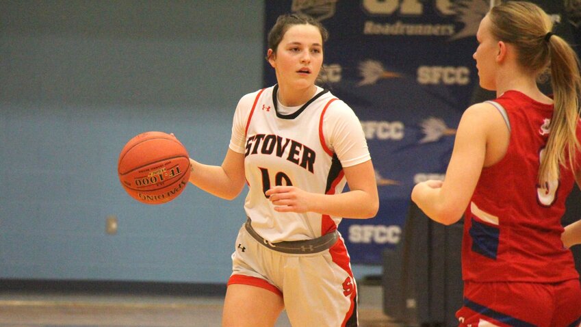 Stover senior Ashlyn Pinzke (10) dribbles the ball during the Kaysinger Conference Tournament first round game against Sacred Heart on Saturday, Feb. 1, at State Fair Community College. Pinzke scored 23 points against Smithton on Friday, Feb. 21, to help the Lady Bulldogs clinch the Kaysinger Conference regular season title.   File photo by Jack Denebeim | Democrat
