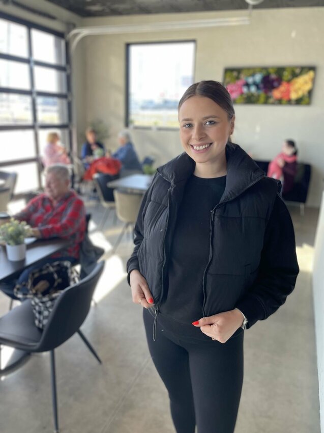 Emilee Limanskiy and her husband Daniel bought a former Texaco gas station on South Limit Avenue and spent a year stripping it and building Lux Coffee Co. The working garage doors can be still raised on nice days for dining al fresco.


Photo by Chris Howell | Democrat