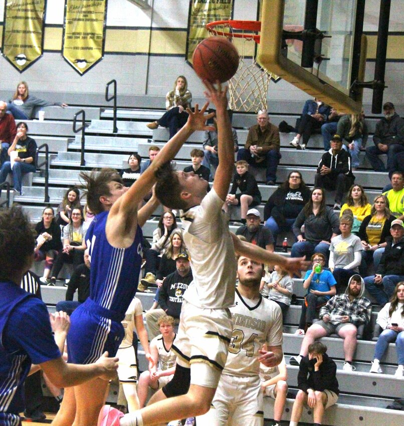 Windsor sophomore Ryan Millington scores a layup during the Class 3 District 13 Tournament semifinal game against Cole Camp on Wednesday, Feb. 26, at Windsor High School. Millington led the Greyhounds with 18 points on the night.   Photo by Jack Denebeim | Democrat