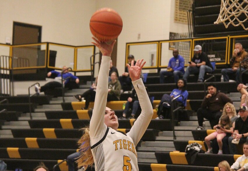 Smith-Cotton senior Eliza Cavanagh rises up for a shot during the game against Capital City on Tuesday, Feb. 25, at Smith-Cotton High School. Cavanagh led the Lady Tigers to a win on senior night by scoring 21 points.   Photo by Jack Denebeim | Democrat