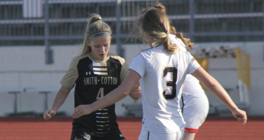 Smith-Cotton's Piper Cantrell battles for the ball during a game against Chillicothe last season. Cantrell scored three goals in the Lady Tigers' jamboree Saturday, March 15.   File photo by Jack Denebeim | Democrat