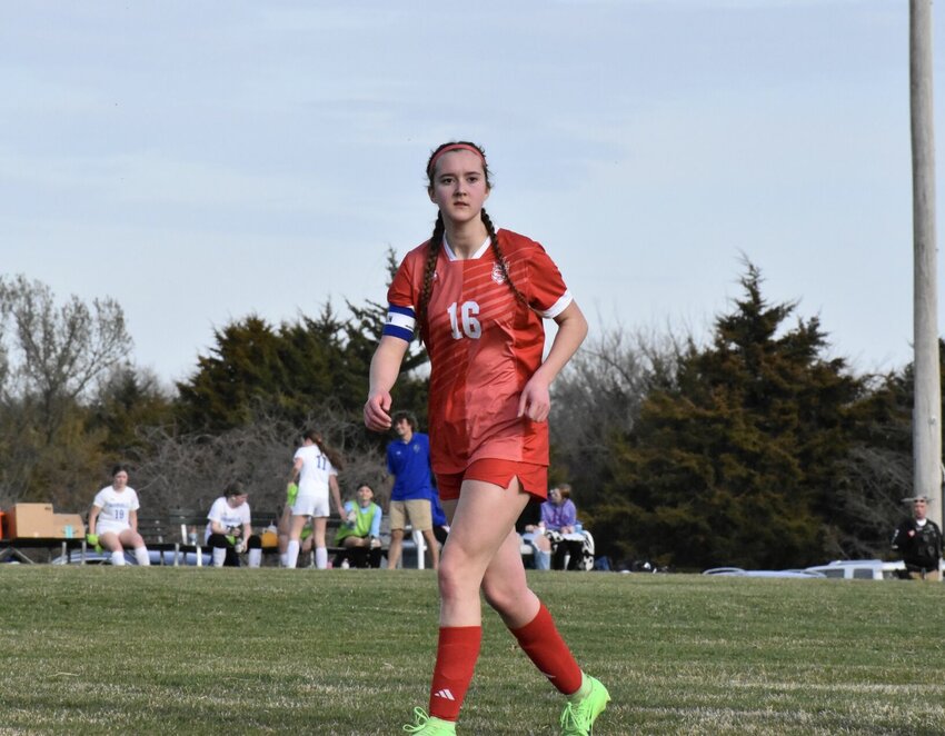 Sacred Heart senior Joleen Frost watches a play unfold during the game agaisnt Boonville on Tuesday, March 25, at Clover Dell Park. Frost scored two goals on the night.   Photo courtesy of Sacred Heart athletics