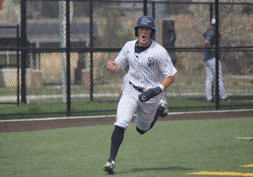 State Fair Community College sophomore Sam Paule pumps his fist as he rounds third during the first game of a doubleheader against St. Charles Community College on Saturday, March 29, at Smith-Cotton High School. Paule went 5-for-13 with five RBIs in a four-game series against St. Louis Community College starting Thursday, April 3, and ending Sunday, April 6.&nbsp;   Photo by Jack Denebeim | Democrat