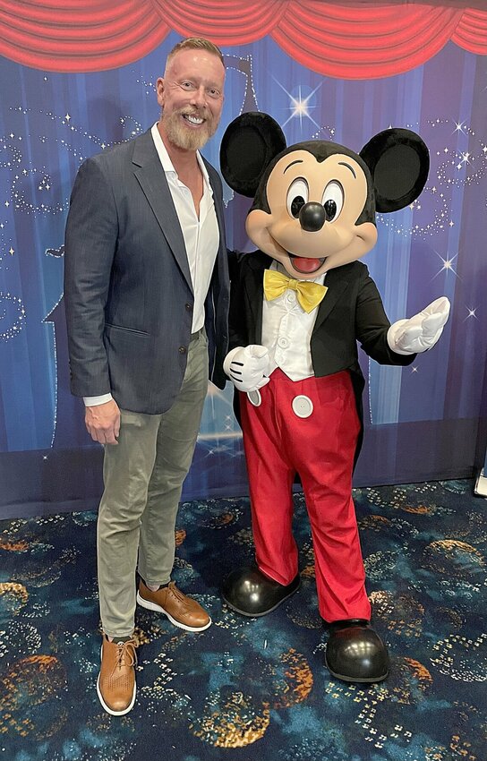Chad Alexander Williams, a 1993 graduate of Smith-Cotton High School, will be inducted into the S-C Hall of Fame on May 1. Williams, a creative director/producer who began his career as a choreographer, is seen in a March 2025 photo with Mickey at Disneyland on the 10th anniversary of his company, HEART OF AMERICA (HOA).


Photo courtesy of Chad Williams