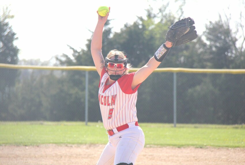 Lincoln senior Braylin Paxton pitches the ball during the Kaysinger Conference Tournament championship game against Green Ridge on Saturday, April 12, in Lincoln. Paxton pitched all six innings, allowed no runs on two hits, walked one and struck out 11.   Photo by Jack Denebeim | Democrat