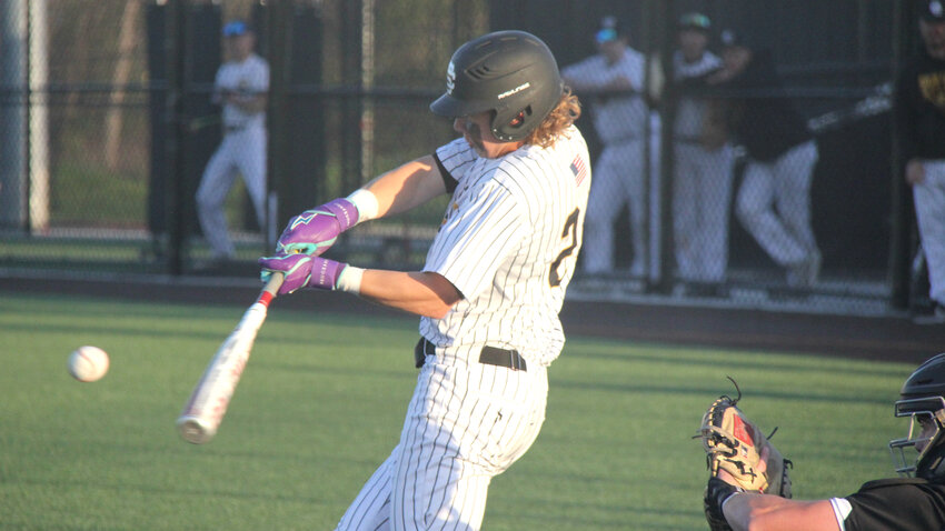Smith-Cotton junior Talon Newell hits the ball during the game against Hickman on Tuesday, April 15, at Smith-Cotton High School. Newell went 2-for-3 at the plate and provided the go-ahead RBI in the third inning.