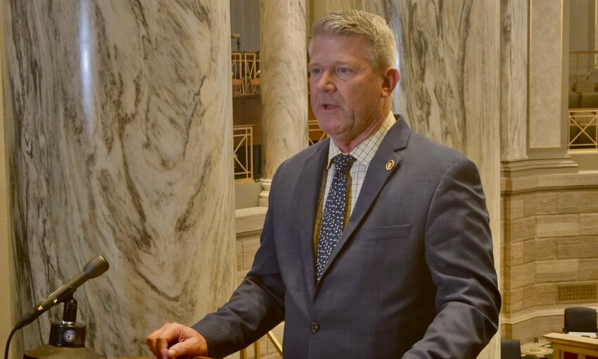 State Sen. Doug Beck, D-Affton, speaks to reporters in April 2022.