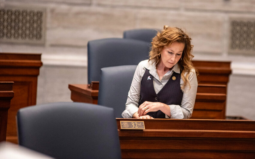 Sen. Jill Carter, a Republican from Granby, sits at her desk on the Senate floor. Carter has filed a bill for three consecutive years on school accreditation and accountability.