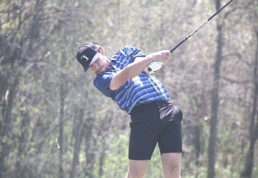 Cole Camp senior Spencer Godwin tees off during the Kaysinger Conference Tournament on Thursday, April 17, at Clinton Country Club. Godwin led the Bluebirds to their fifth straight conference tournament title by shooting a 79.