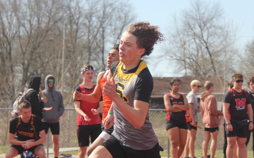 Smith-Cotton junior Giovanni Alicea races around the track during the 200-meter race at the Smith-Cotton Quad on March 21. Alicea was part of the sprint medley team that earned a medal at the Kansas Relays on Saturday, April 19.