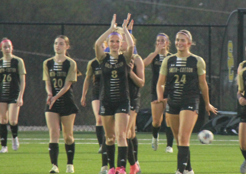 Smith-Cotton junior Alle Case (8) leads the post-game celebration after the Lady Tigers&rsquo; 5-0 win over Capital City on Tuesday, April 22, at the Susie Ditzfeld Memorial Soccer Field.